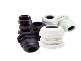 PRENSACABLE COLOR GRIS PVC ROSCA BSP 1/2 " CON TUERCA.